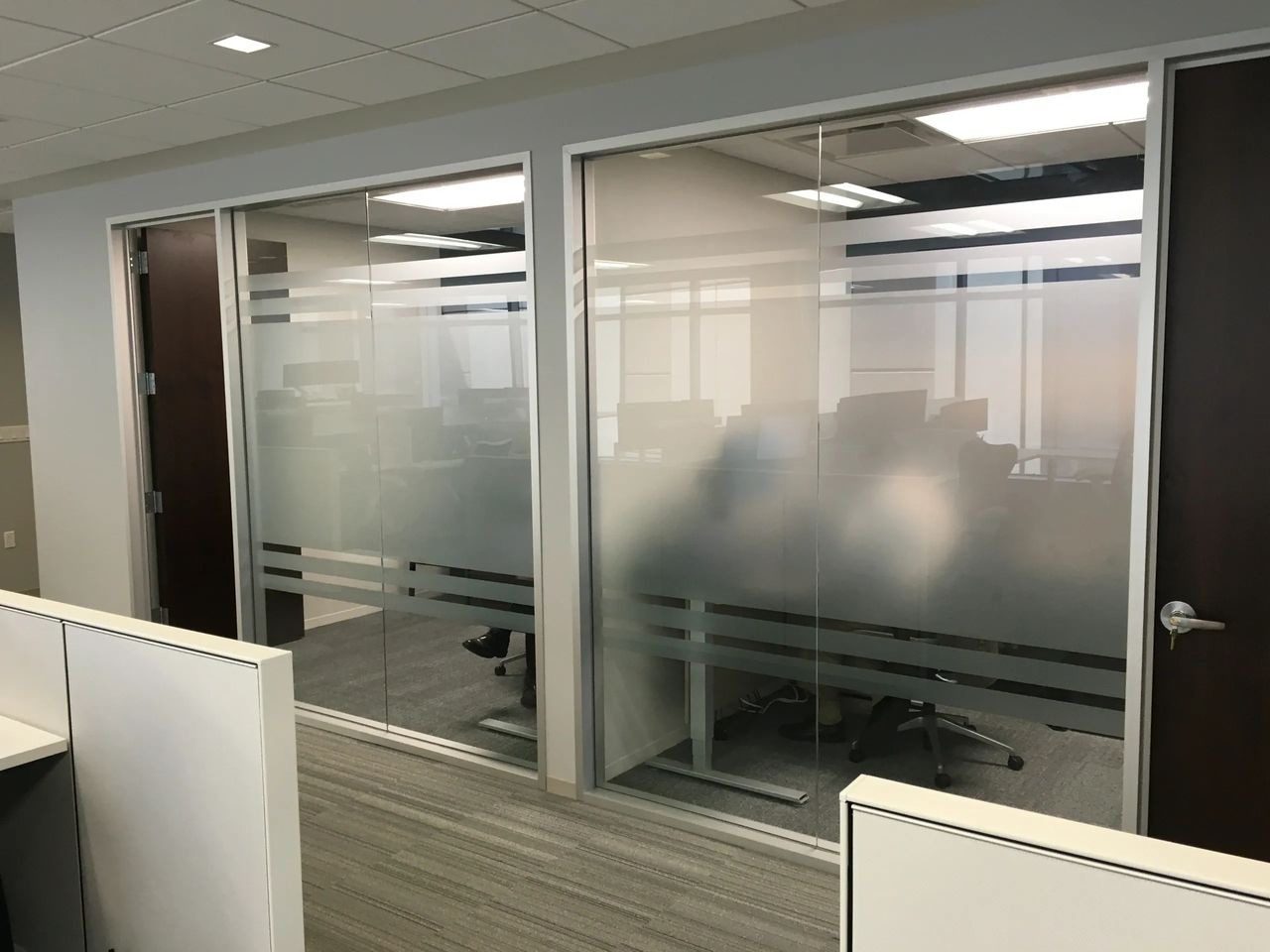 A view of two windows in an office.